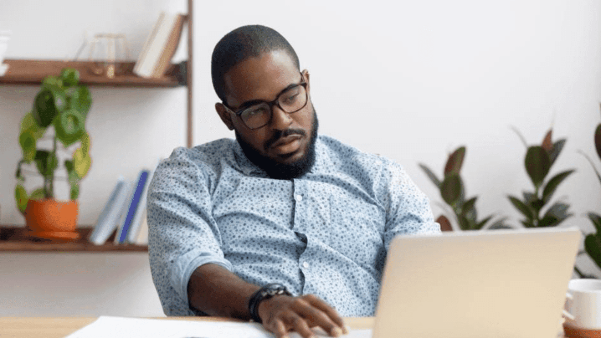 A man looking depressed due to field sales challenges he's facing