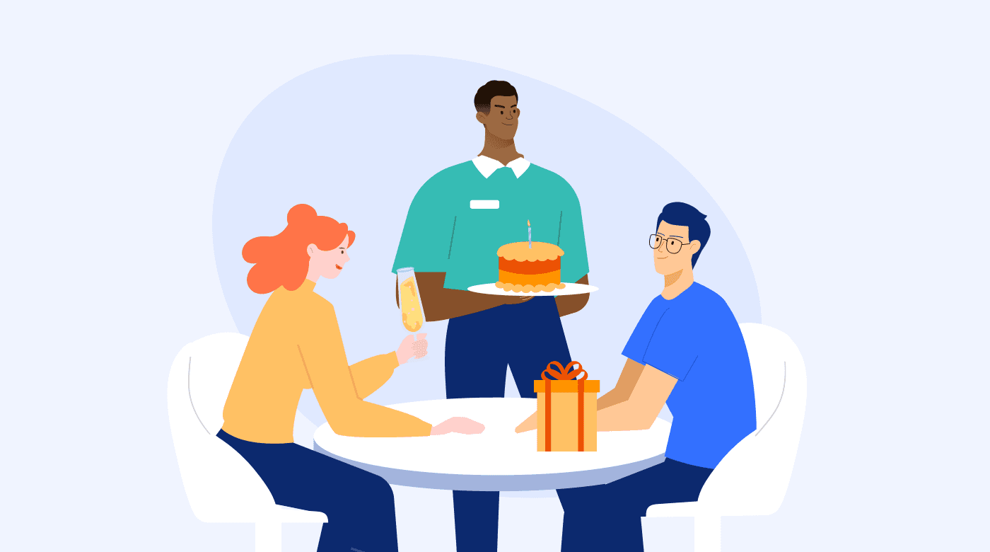 Presenting a customer with a birthday cake