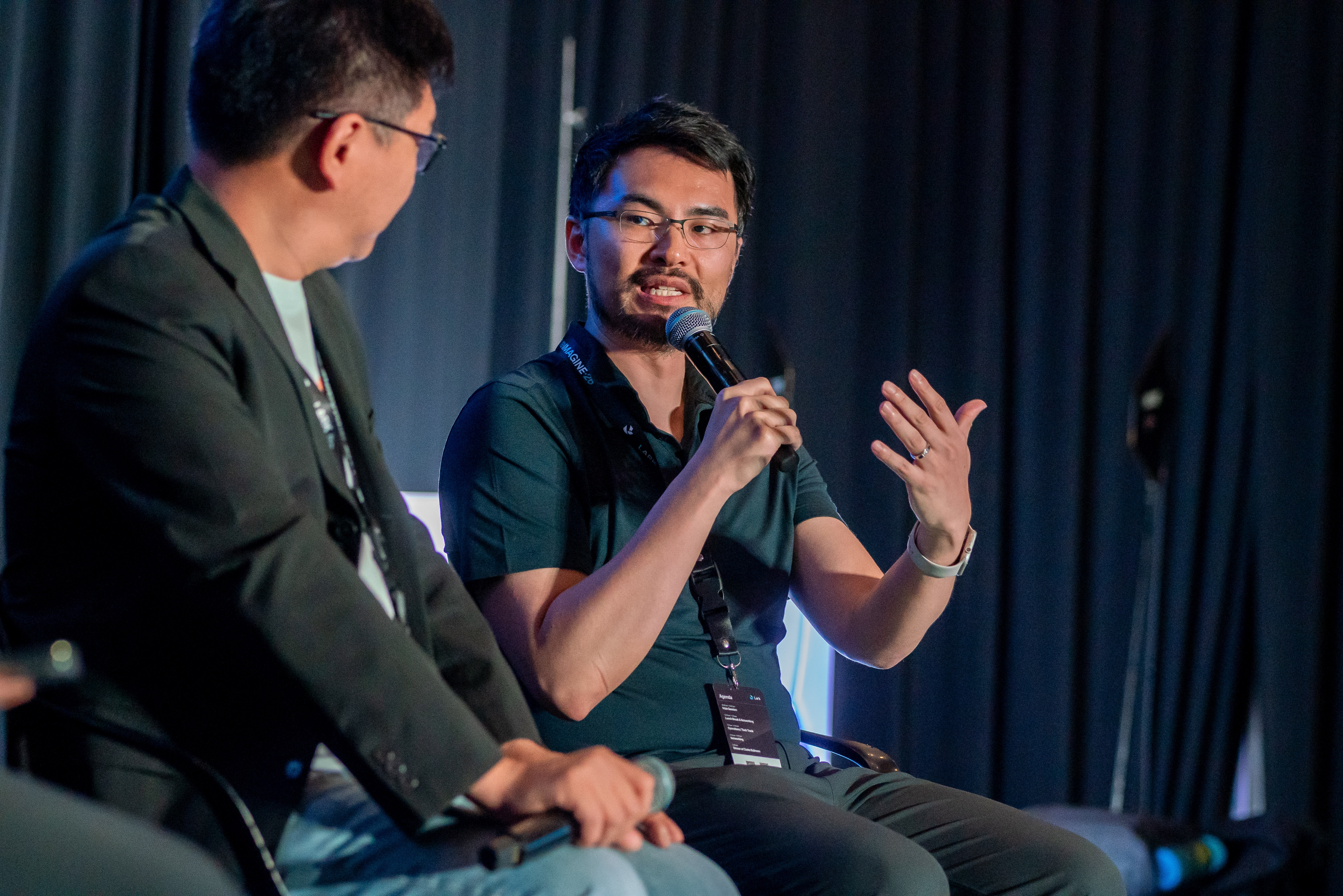 StoreHub Chieftain and co-founder sharing insights during an AI leadership panel at Lark Reimagine 2026