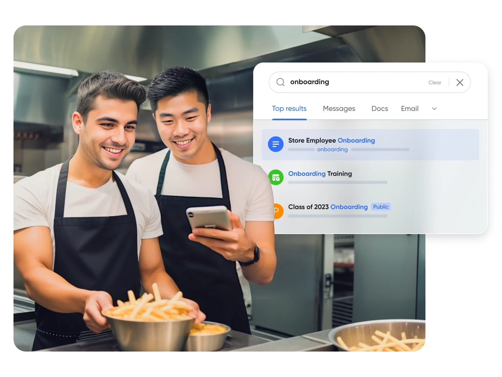 Two kitchen assistants using their phones to access an onboarding guide