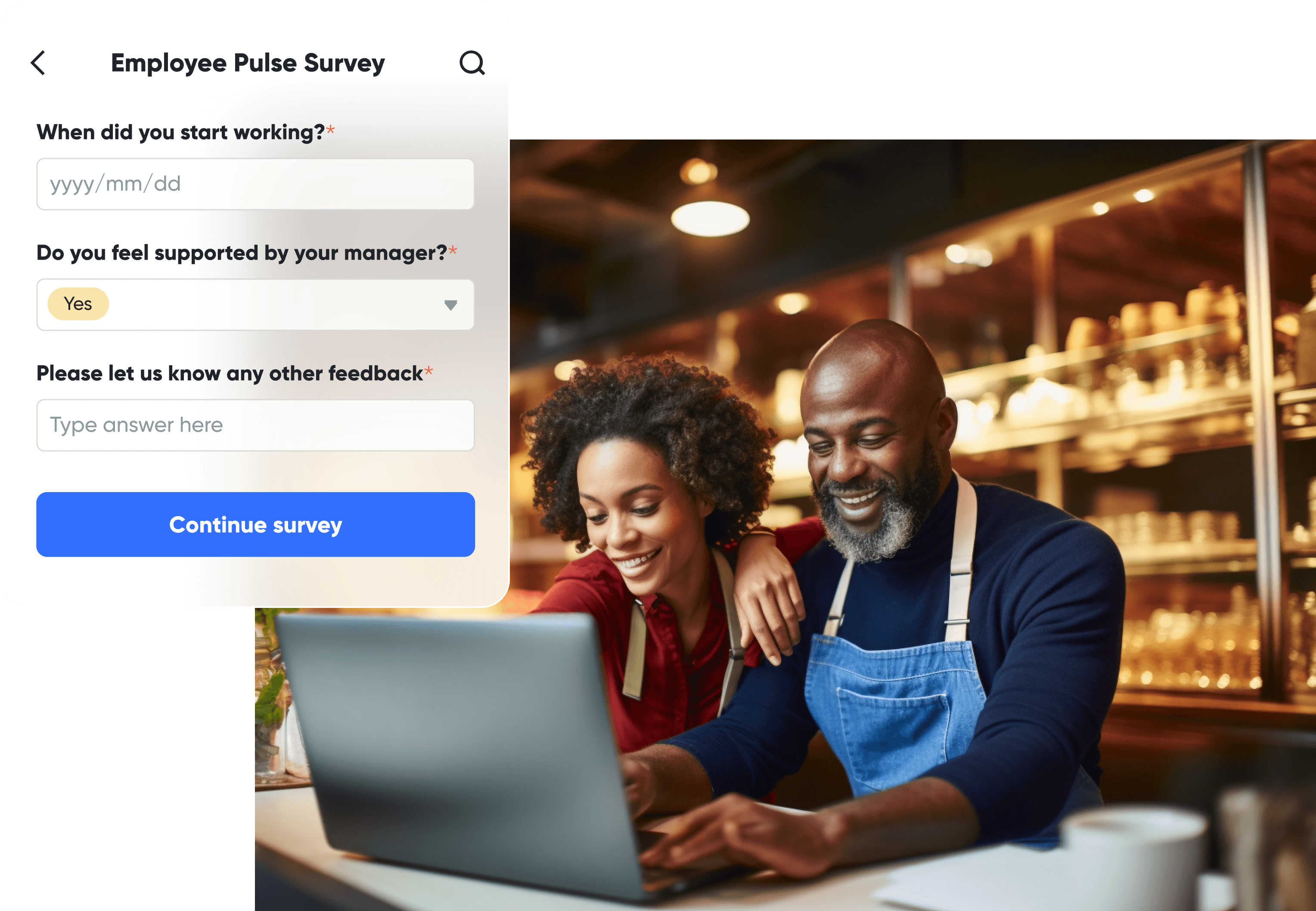 Use the right employee pulse survey tool. Two restaurant managers are sitting in their store and trying to review the employee pulse survey results on a laptop, looking excited.